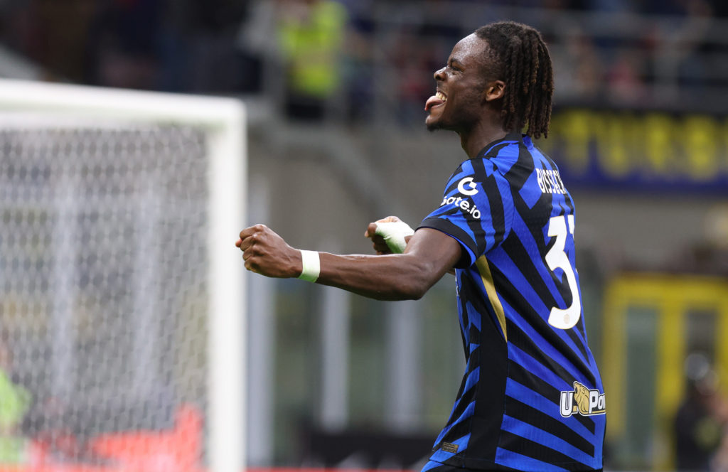 Inter's Yann Aurel Bisseck celebrates scoring against Lazio in Serie A.