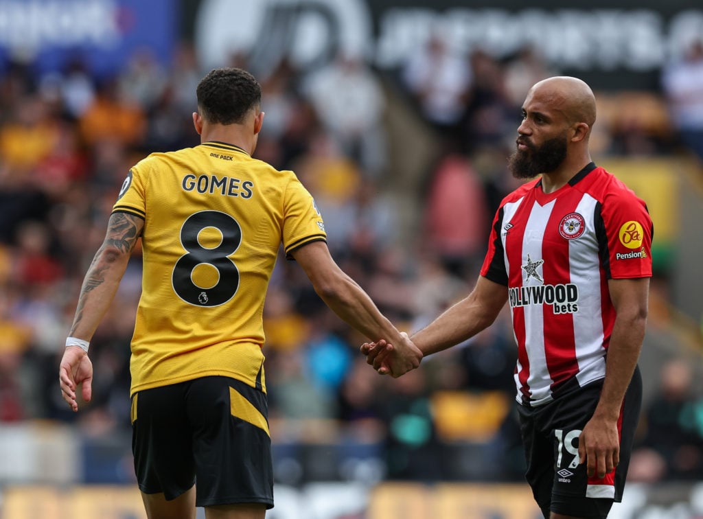 Wolverhampton Wanderers' Joao Gomes shake hands with Brentford's Bryan Mbeumo