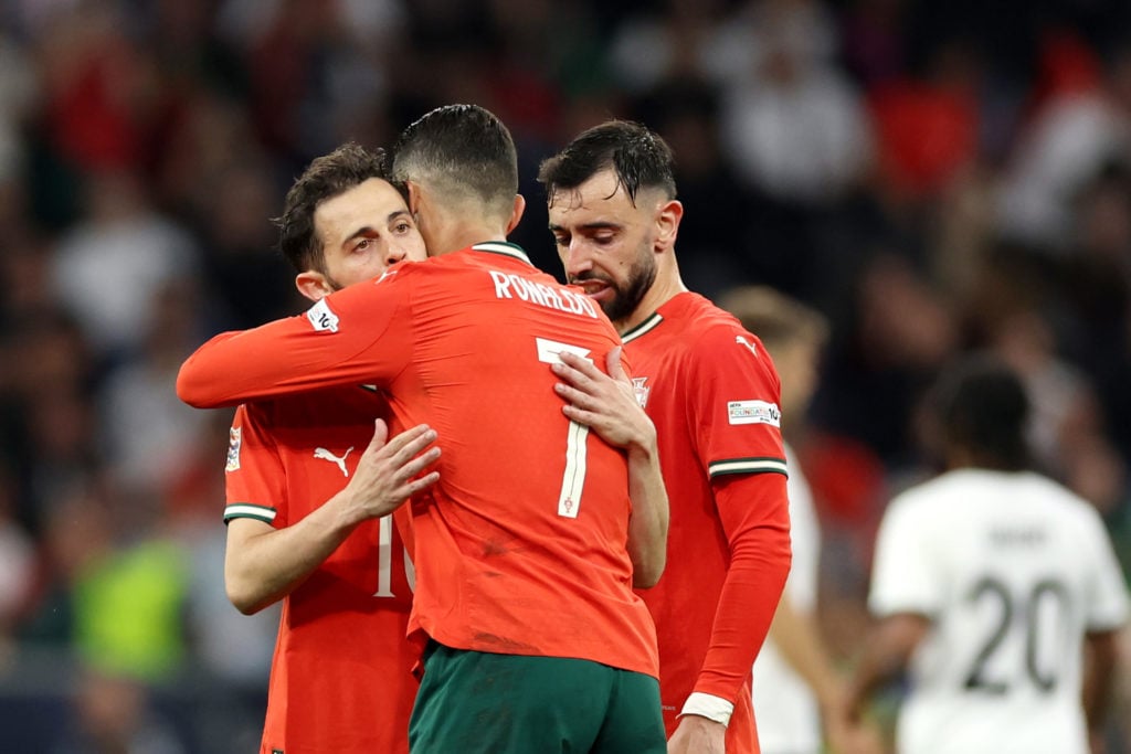Cristiano Ronaldo celebrates the victory with Bernardo Silva and Manchester United star Bruno Fernandes during the Nations league match between Germany and Portugal at the Allianz Arena in 2025 in Munich, Germany.