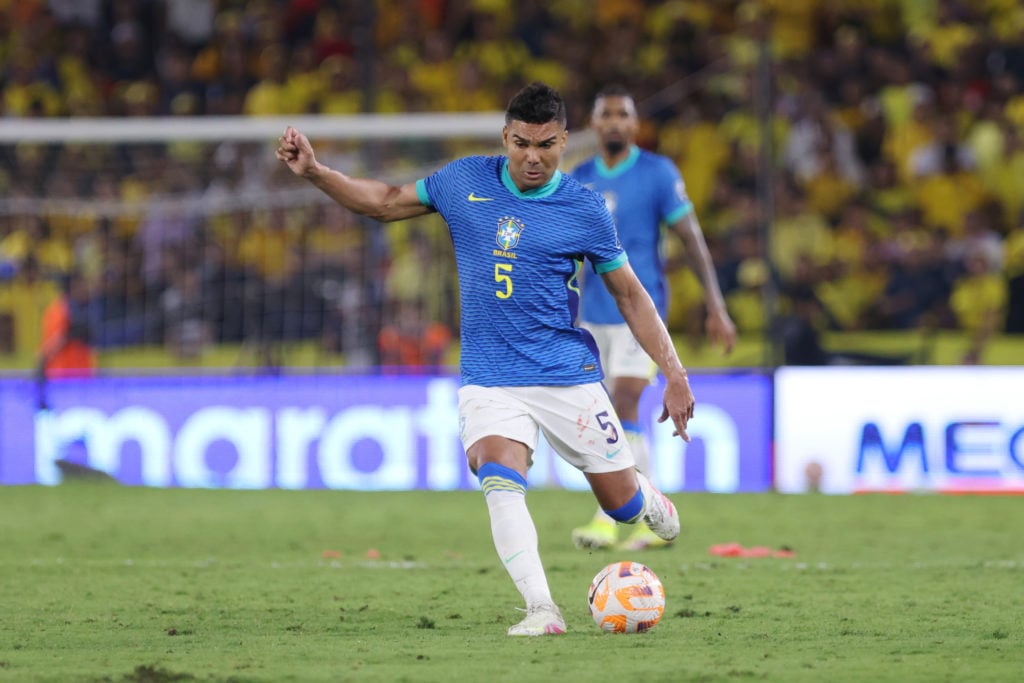 Casemiro playing for Brazil, in blue kit