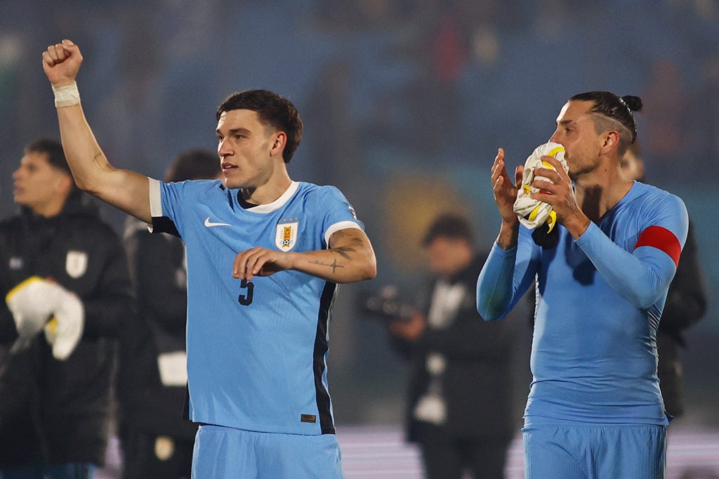 Manuel Ugarte acknowledges fans after Uruguay win.