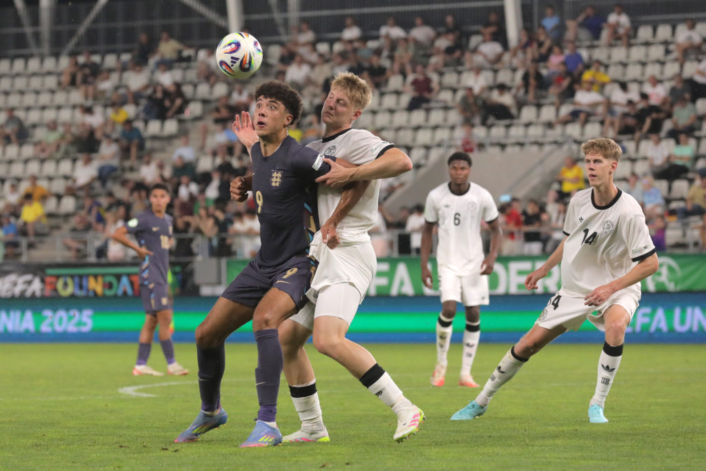 Ethan Wheatley holds up the ball playing for England vs Germany