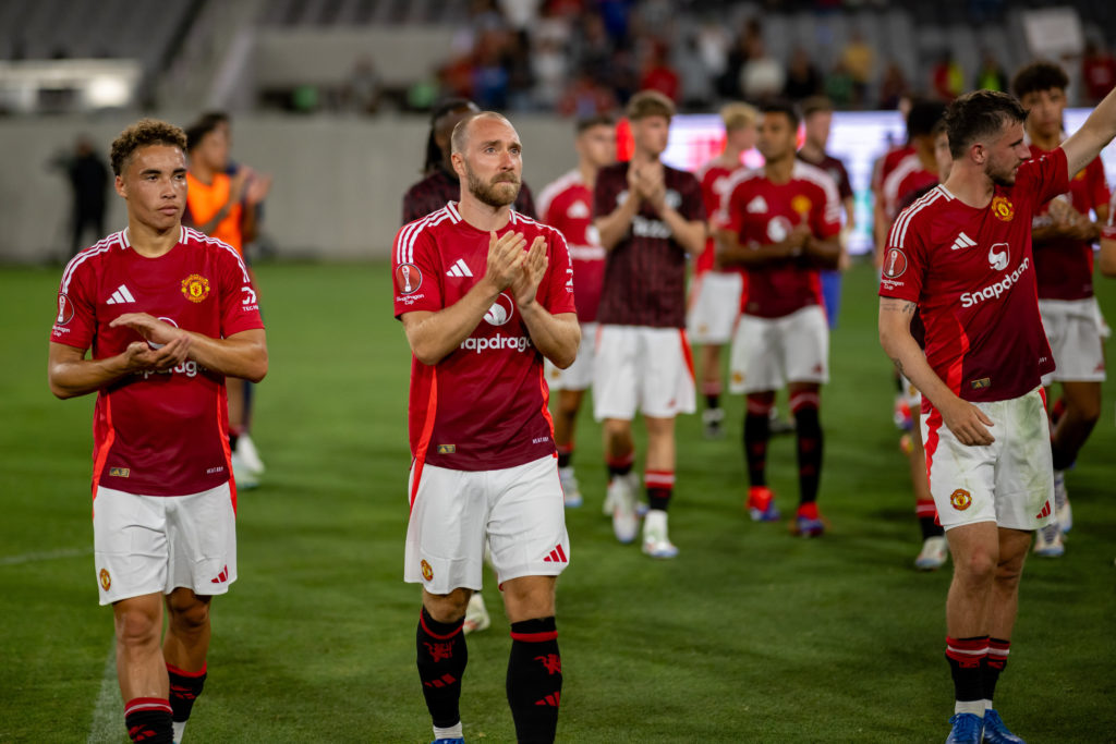 Sam Murray, Christian Eriksen and Mason Mount of Manchester United applaud the fans after a pre-season friendly match between Manchester United v Real Betis at Snapdragon Stadium on July 31, 2024