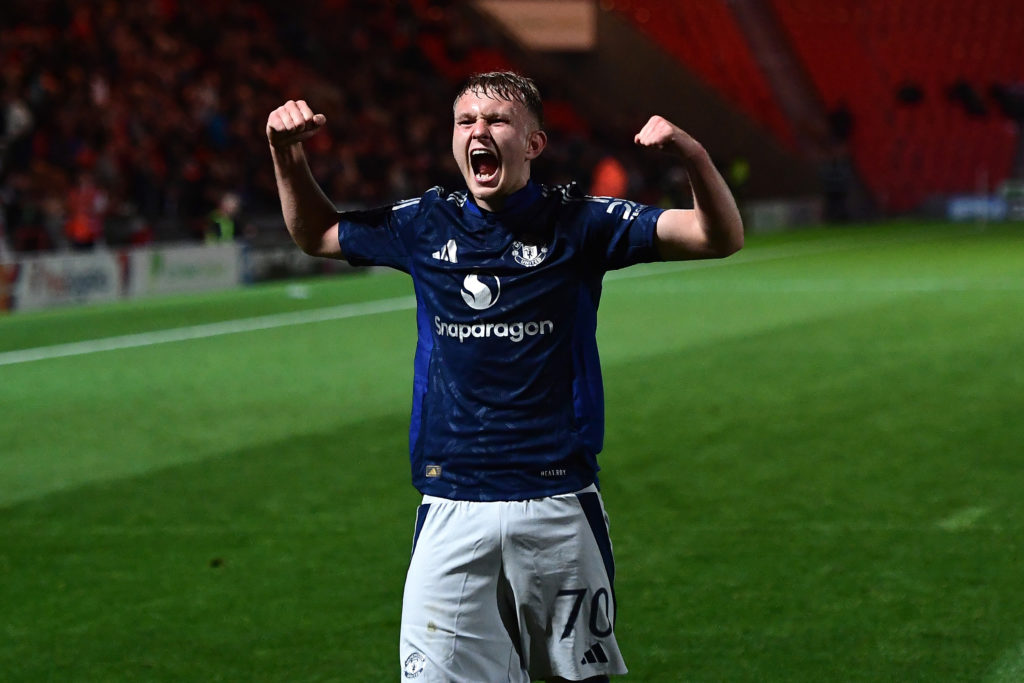 Finley McAllister of Manchester United celebrates during the Bristol Street Motors Trophy match between Doncaster Rovers and Manchester United at Eco-Power Stadium on September 24, 2024