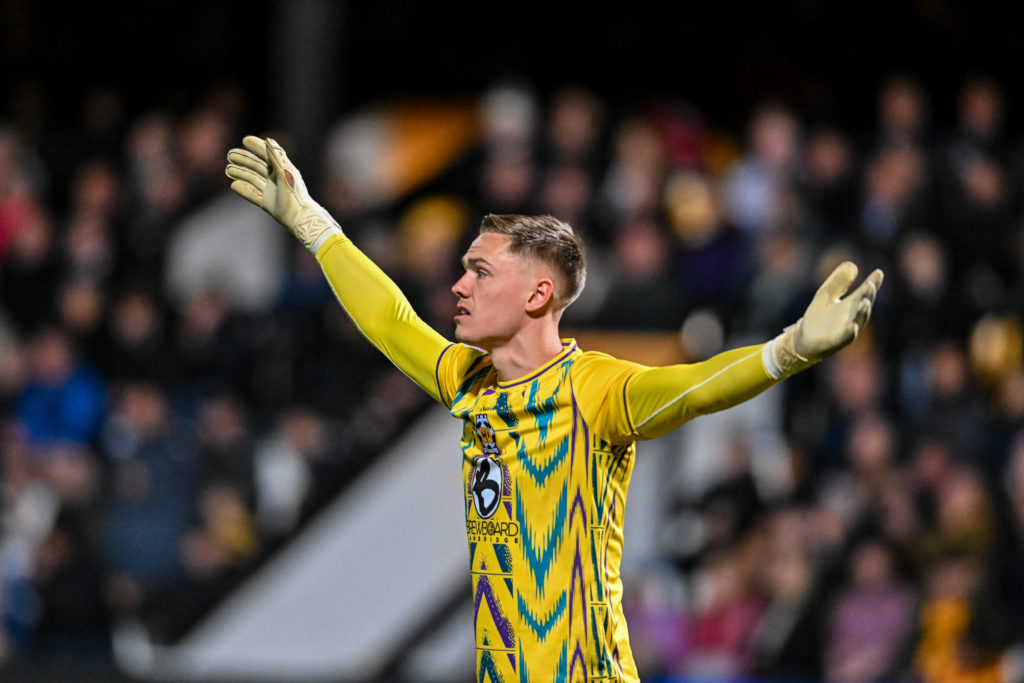Nathan Bishop with arms outstretched