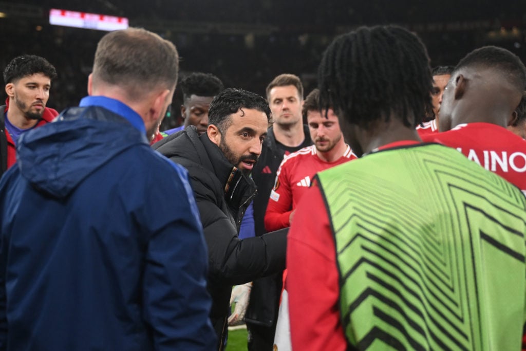 Manchester United manager Ruben Amorim speaks to the team ahead of extra time during the UEFA Europa League match between Manchester United and Lyon at Old Trafford in 2025 in Manchester.