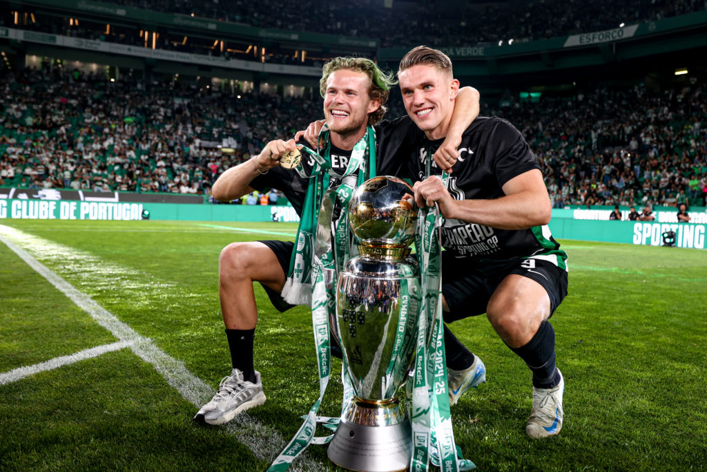 Viktor Gyokeres and Morten Hjulmand hold the Liga Portugal Betclic trophy.