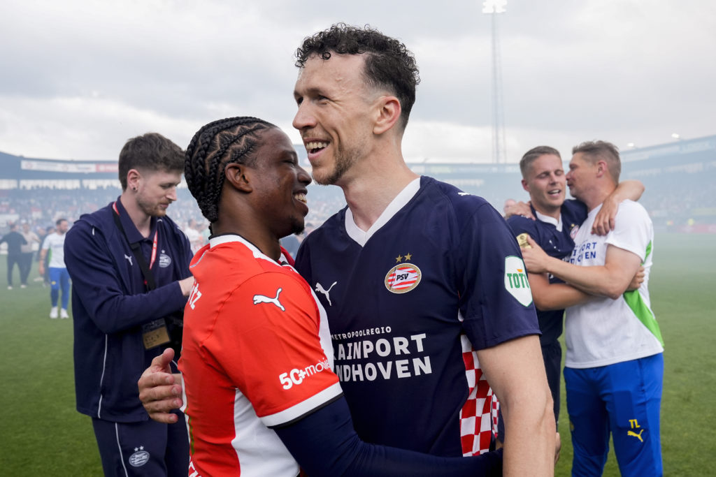 Tyrell Malacia sharing a moment against Sparta during his time at PSV Eindhoven