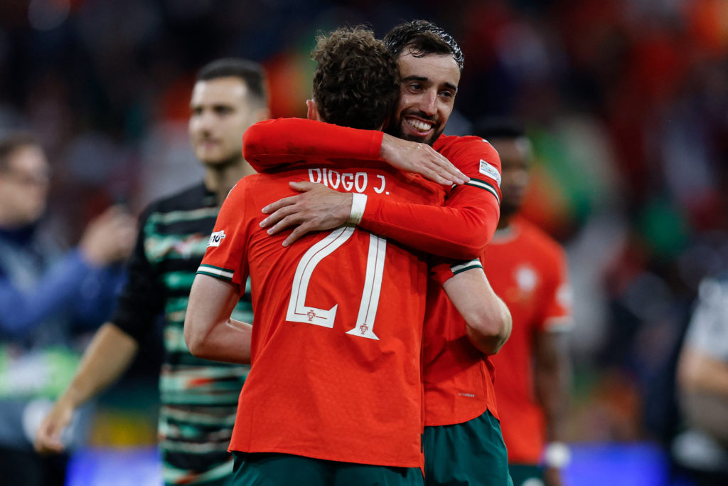Bruno Fernandes hugging Diogo Jota after the Nations League win