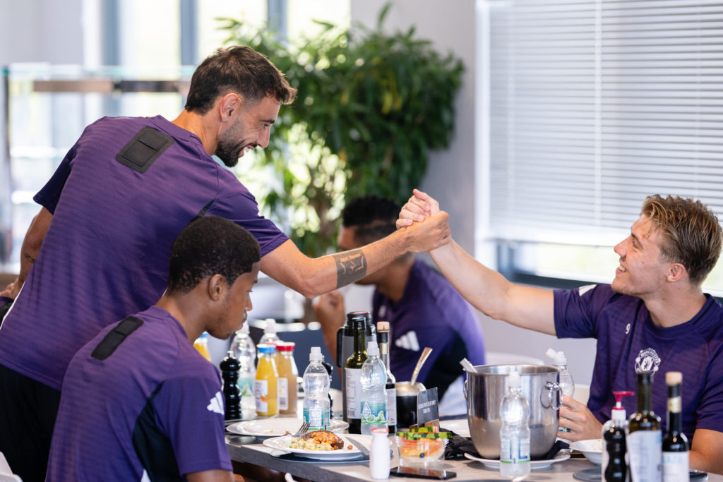 Rasmus Hojlund, Chido Obi and Bruno Fernandes back at Carrington in Manchester United training kit.