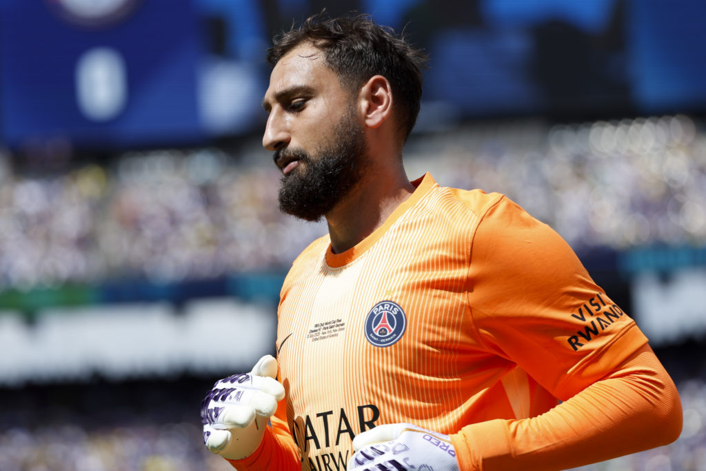 Gianluigi Donnarumma, side view, orange PSG jersey