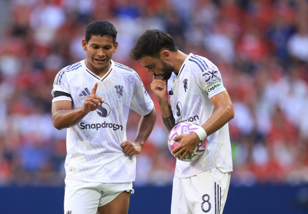Manchester United defender Diego Leon speaks to Bruno Fernandes during the pre-season friendly.