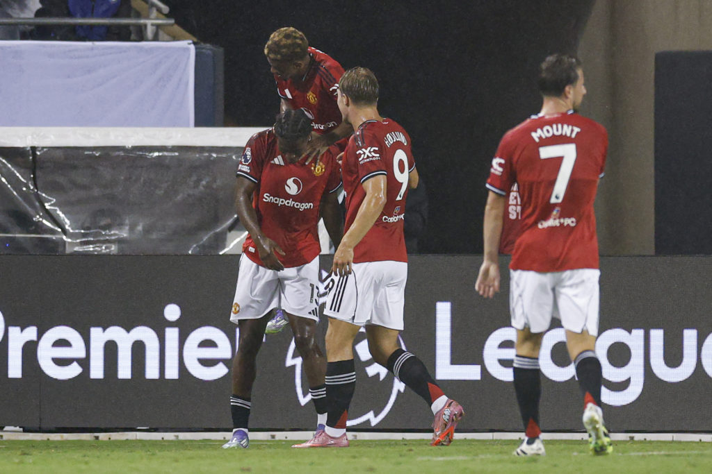 Manchester United defender Patrick Dorgu celebrates scoring his team’s second with his teammates during the Premier League Summer Series football match between Manchester United and Bournemouth at the Soldier Field in Chicago, Illinois, in 2025.
