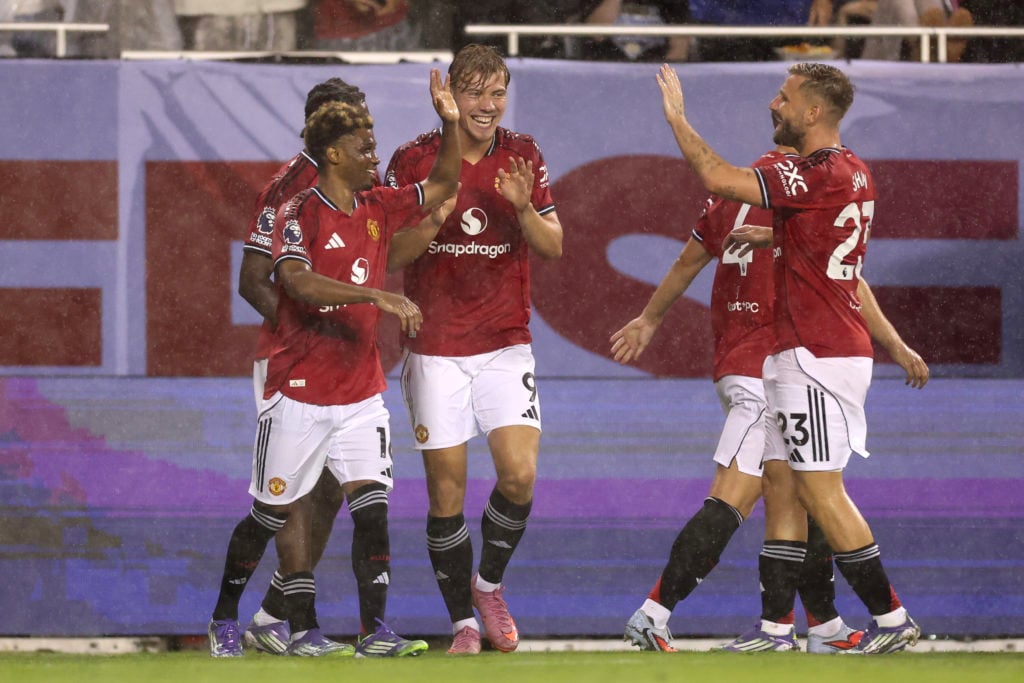 Amad of Manchester United celebrates after scoring the team's third goal whilst under pressure from during the Premier League Summer Series match between Manchester United and AFC Bournemouth at Soldier Field on July 30, 2025