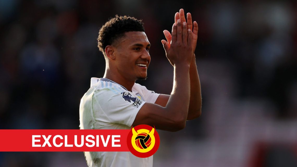 Ollie Watkins applauds Aston Villa fans in white kit. Overlaid UIF logo and exclusive banner.