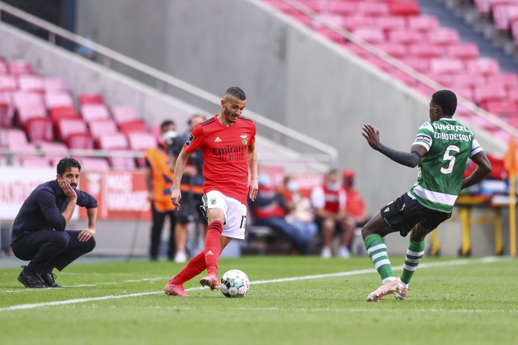 Nuno Mendes defending for Sporting, Ruben Amorim watching on the touchline