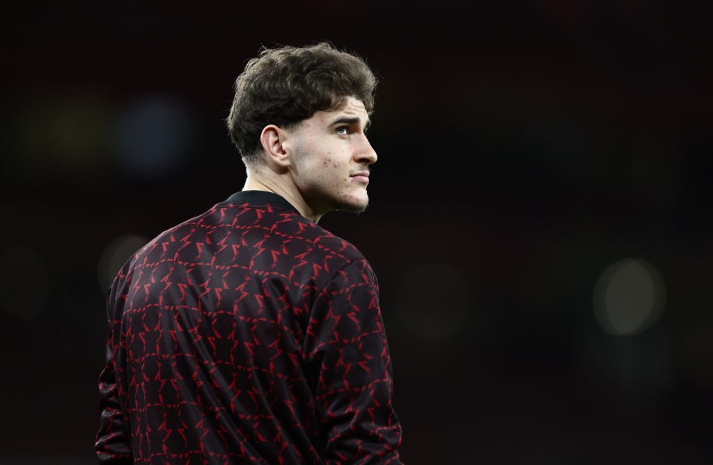 Cameron Byrne-Hughes in Manchester United training outfit from behind.