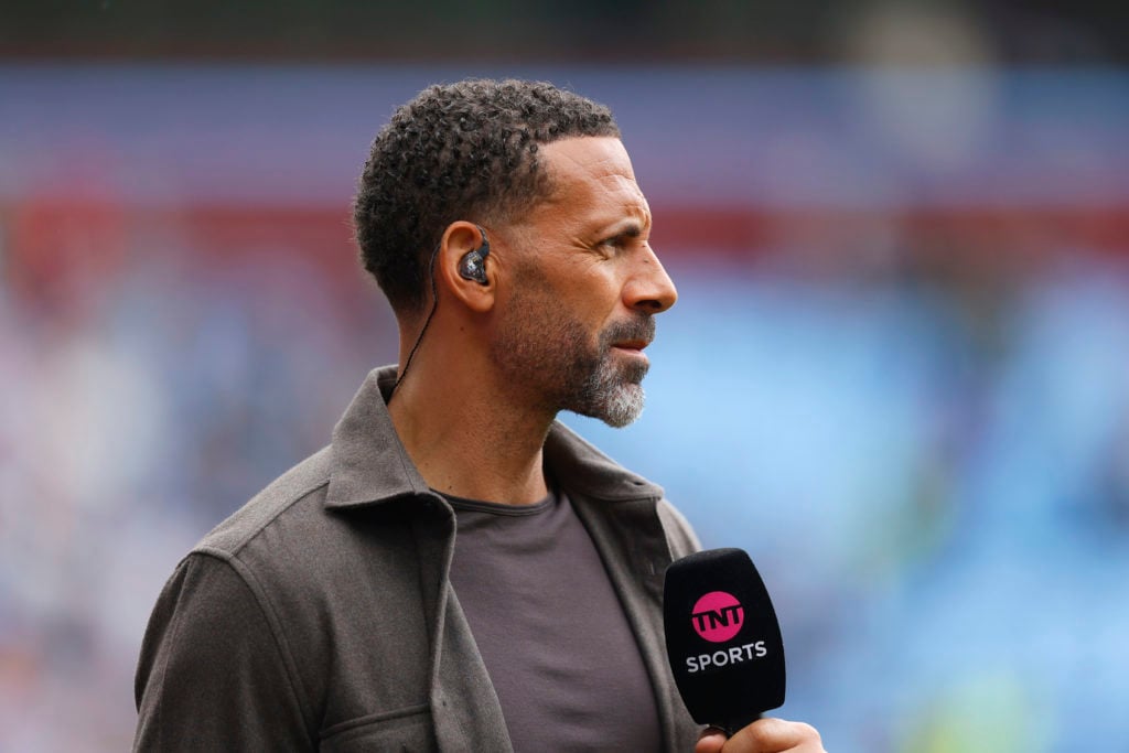 TNT Sports pundit Rio Ferdinand looks on during the Premier League match between Aston Villa and Fulham at Villa Park in 2025 in Birmingham, England.