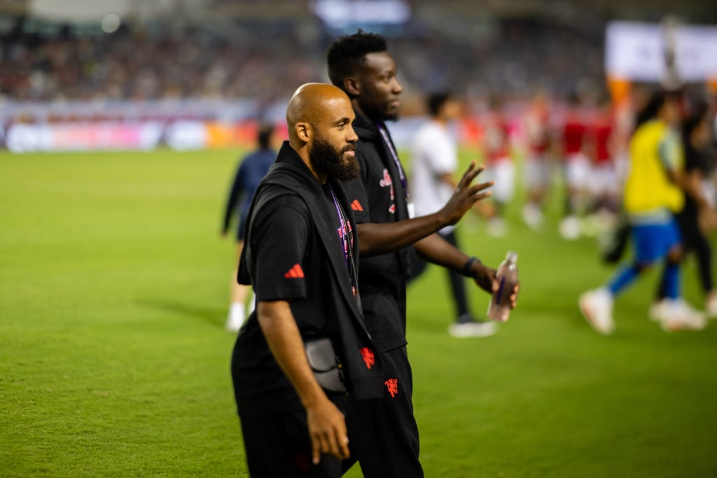 Bryan Mbeumo and Andre Onana of Manchester United walk out ahead of the Premier League Summer Series match between Manchester United and AFC Bournemouth