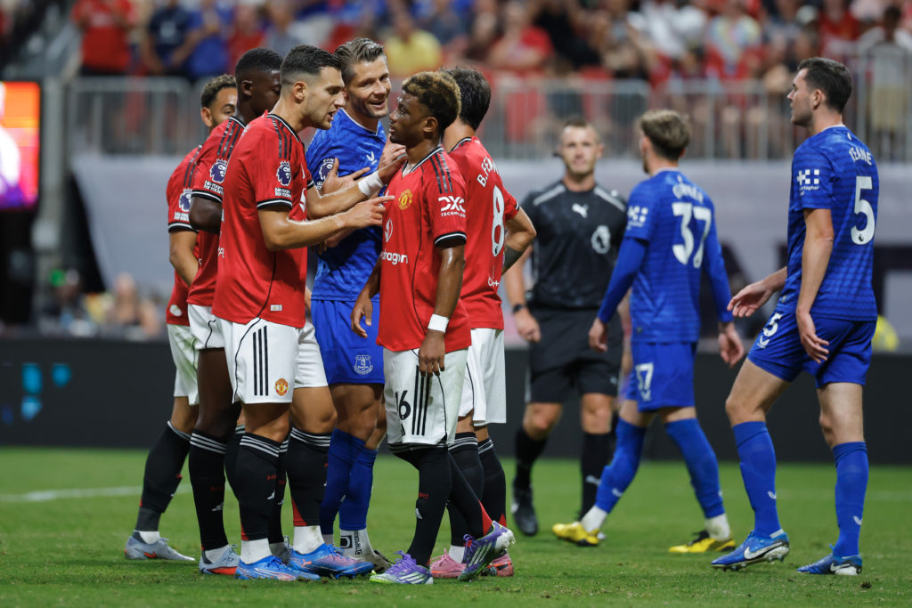 Diogo Dalot talks to Amad Diallo during the Premier League Summer Series match between Manchester United and Everton at the Mercedes-Benz Stadium on in 2025 in Atlanta, Georgia.