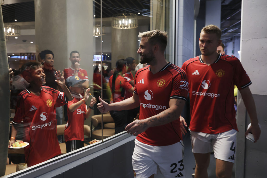 Luke Shaw and Matthijs de Ligt of Manchester United enter the pitch for the second half during the Premier League Summer Series match between Manchester United and Everton FC at Mercedes-Benz Stadium on August 03, 2025
