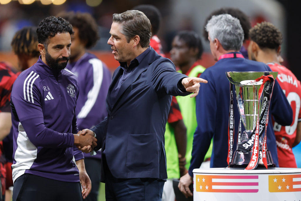 Manchester United manager Ruben Amorim shakes hands with Premier League CEO Richard Masters after the match between Manchester United and Everton at the Mercedes-Benz Stadium in 2025 in Atlanta, Georgia.