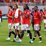 Tyler Fredricson, Leny Yoro, Ayden Heaven and Kobbie Mainoo celebrate winning the Premier League Summer Series after the match between Manchester United and Everton at the Mercedes-Benz Stadium in 2025 in Atlanta, Georgia.