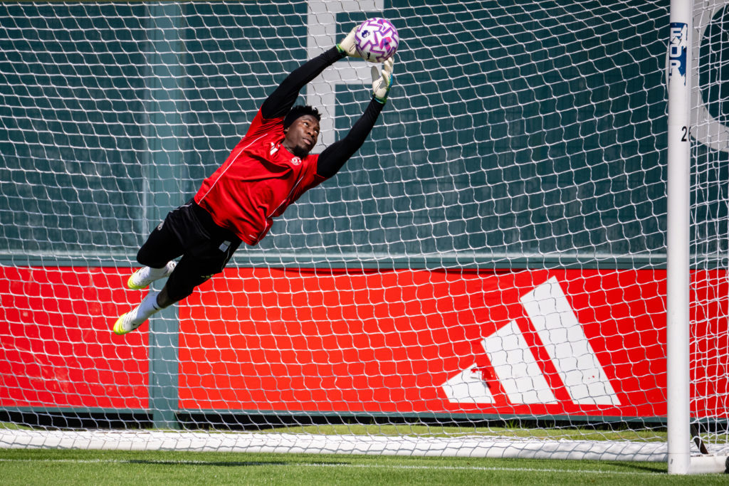 Andre Onana makes full stretch diving catch save in training