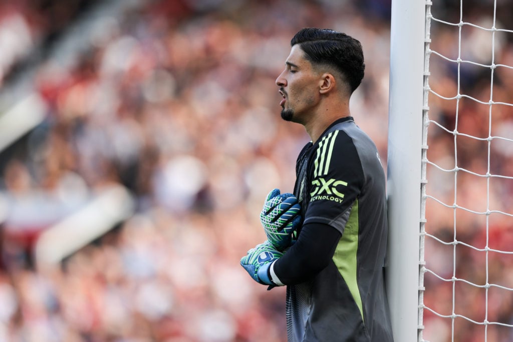 Altay Bayindir rests against the post