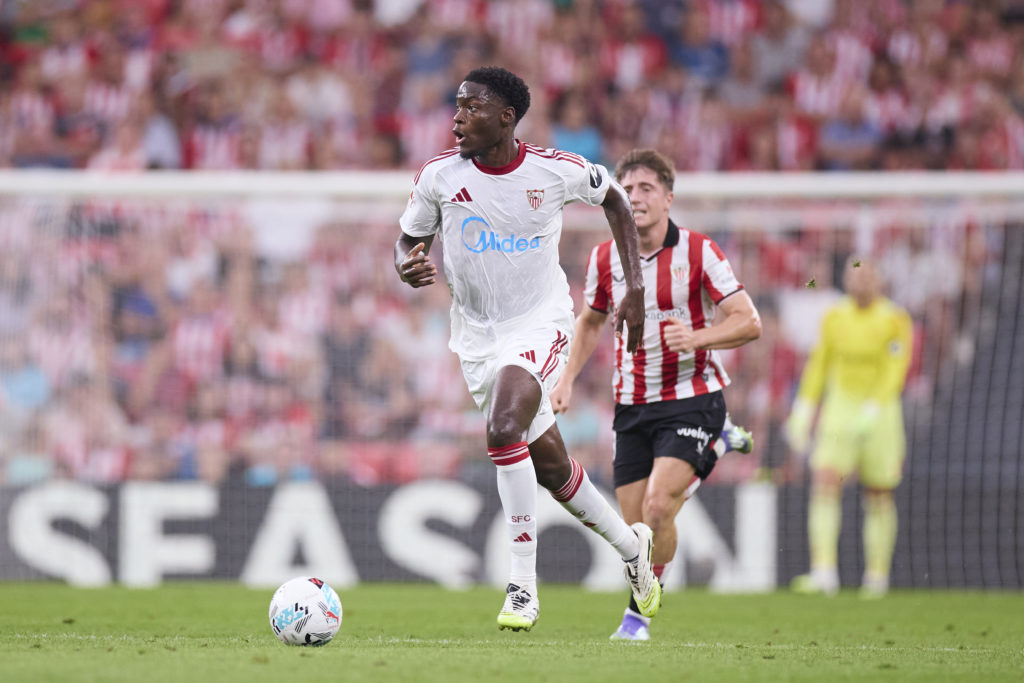 Lucien Agoume dribbling with the ball for Sevilla.
