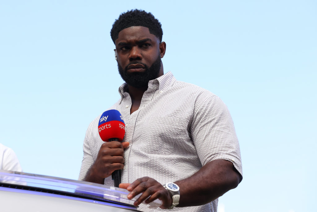 Sky Sports pundit Micah Richards during the Premier League match between Manchester United and Arsenal at Old Trafford in 2025 in Manchester, England.