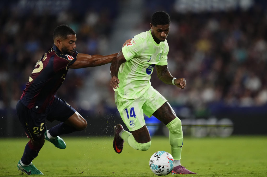 Marcus Rashford left winger of Barcelona and England and Jeremy Toljan right-back of Levante and Germany during the LaLiga EA Sports match between Levante UD and FC Barcelona at Ciutat de Valencia on August 23, 2025