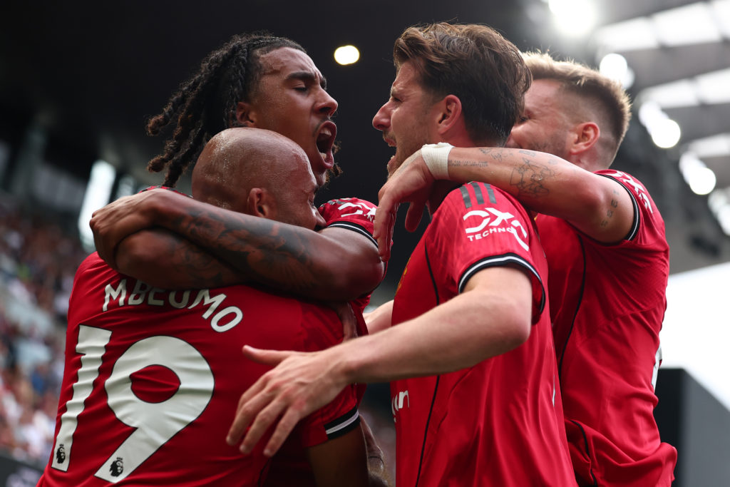 Leny Yoro celebrates with Bryan Mbeumo, Mason Mount and Luke Shaw during the Premier League match between Fulham and Manchester United at Craven Cottage in 2025 in London, England.