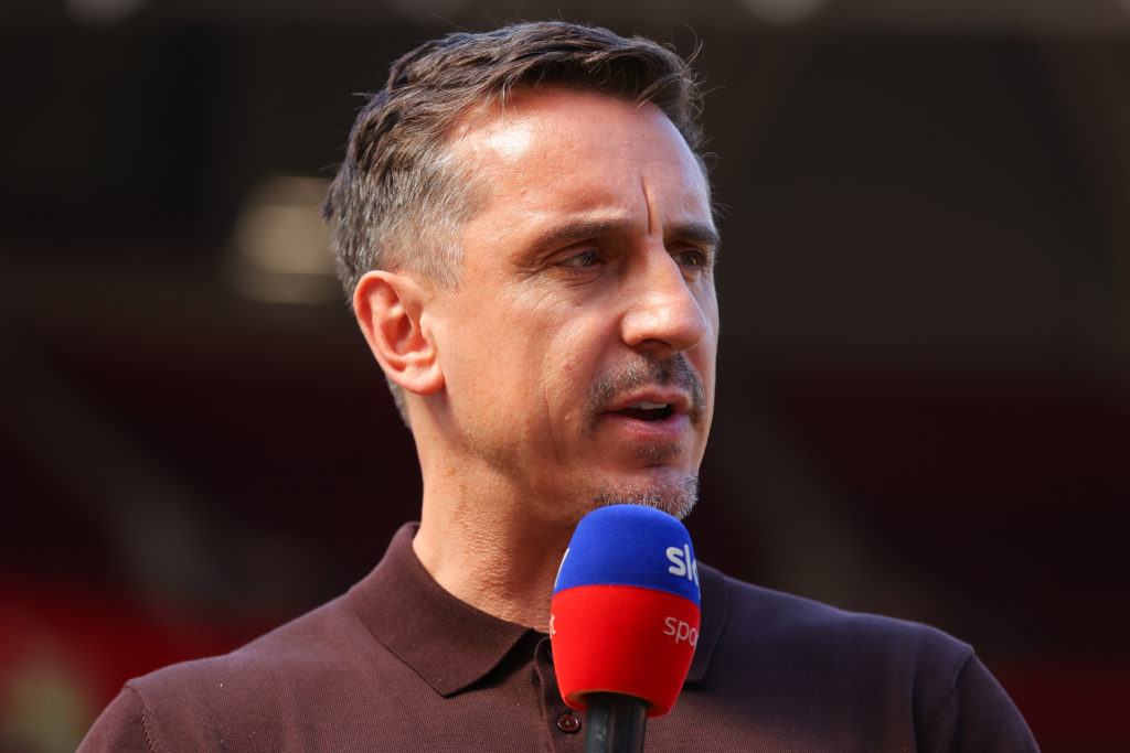Sky Sports pundit Gary Neville presents to the camera ahead of the Premier League match between Manchester United and Arsenal at Old Trafford in 2025 in Manchester, England.