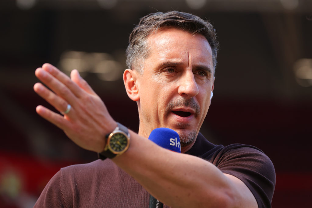 Sky Sports pundit Gary Neville presents to the camera ahead of the Premier League match between Manchester United and Arsenal at Old Trafford in 2025 in Manchester, England.