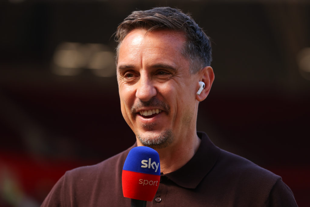 Sky Sports pundit Gary Neville presents to the camera ahead of the Premier League match between Manchester United and Arsenal at Old Trafford in 2025 in Manchester, England.