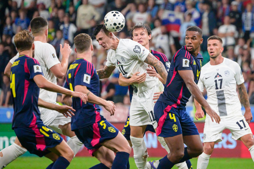 Slovenia's forward #11 Benjamin Sesko (C-L) fights for the ball with Sweden's defender #03 (C-R) during the FIFA World Cup 2026 Group B European qualification football match between Slovenia and Sweden, at the Stozice Stadium in Ljubljana, on September 5, 2025