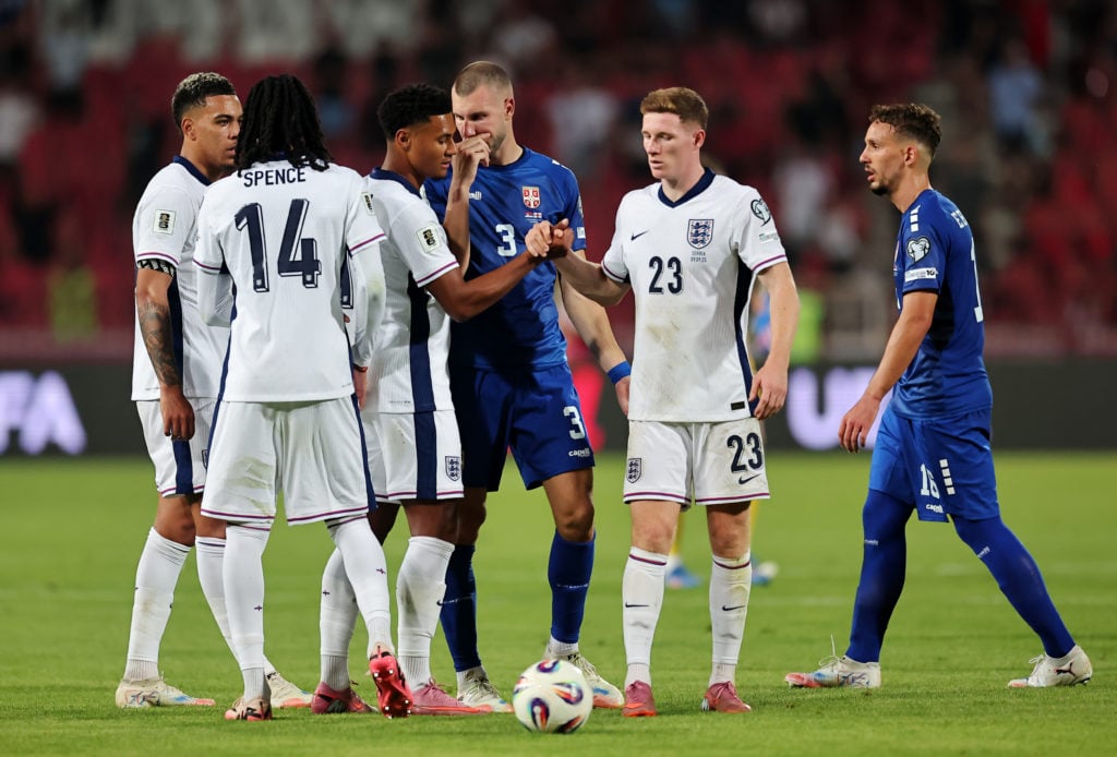 Morgan Rogers, Djed Spence, Ollie Watkins and Elliot Anderson of England shake hands