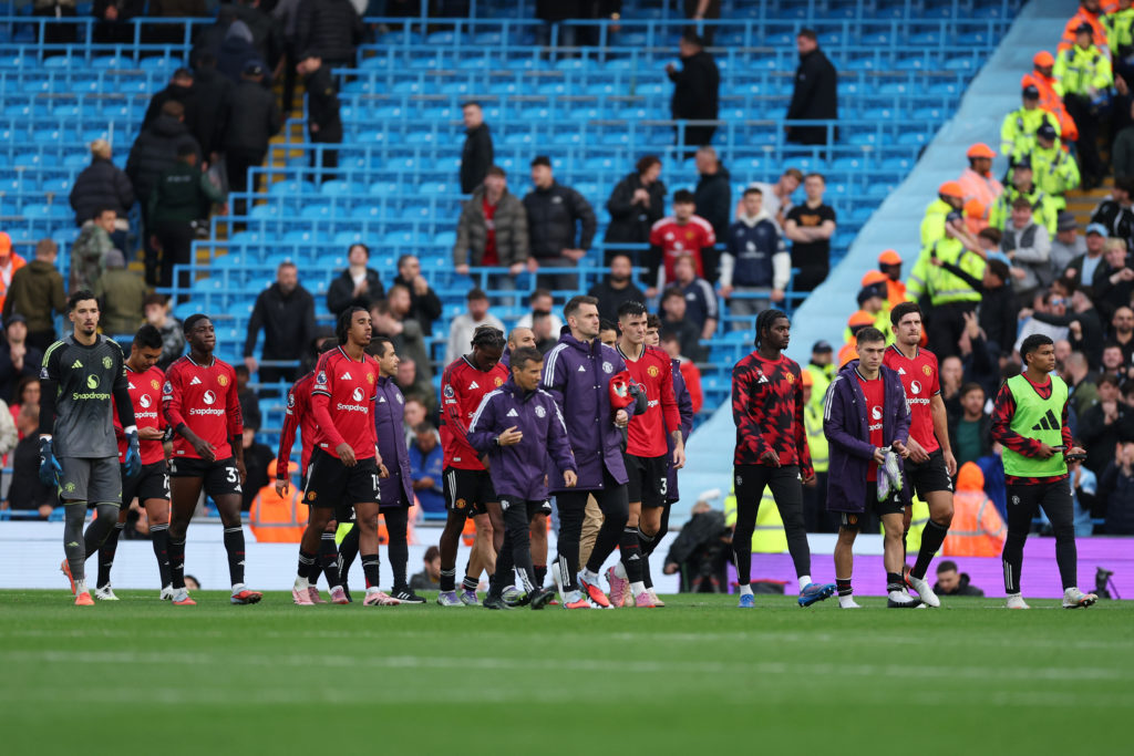 Manchester United players look dejected after the team’s defeat during the Premier League match between Manchester City and Manchester United at the Etihad Stadium in 2025 in Manchester, England.