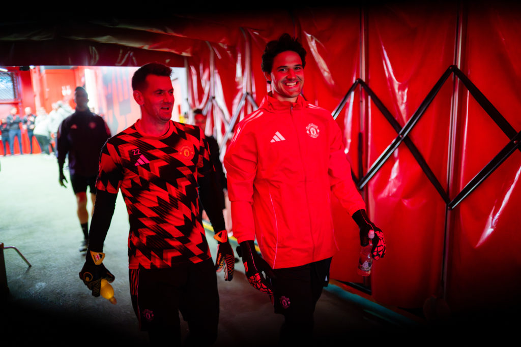 Tom Heaton, Senne Lammens of Manchester United warms up ahead of the Premier League match between Manchester United and Chelsea at Old Trafford on September 20, 2025