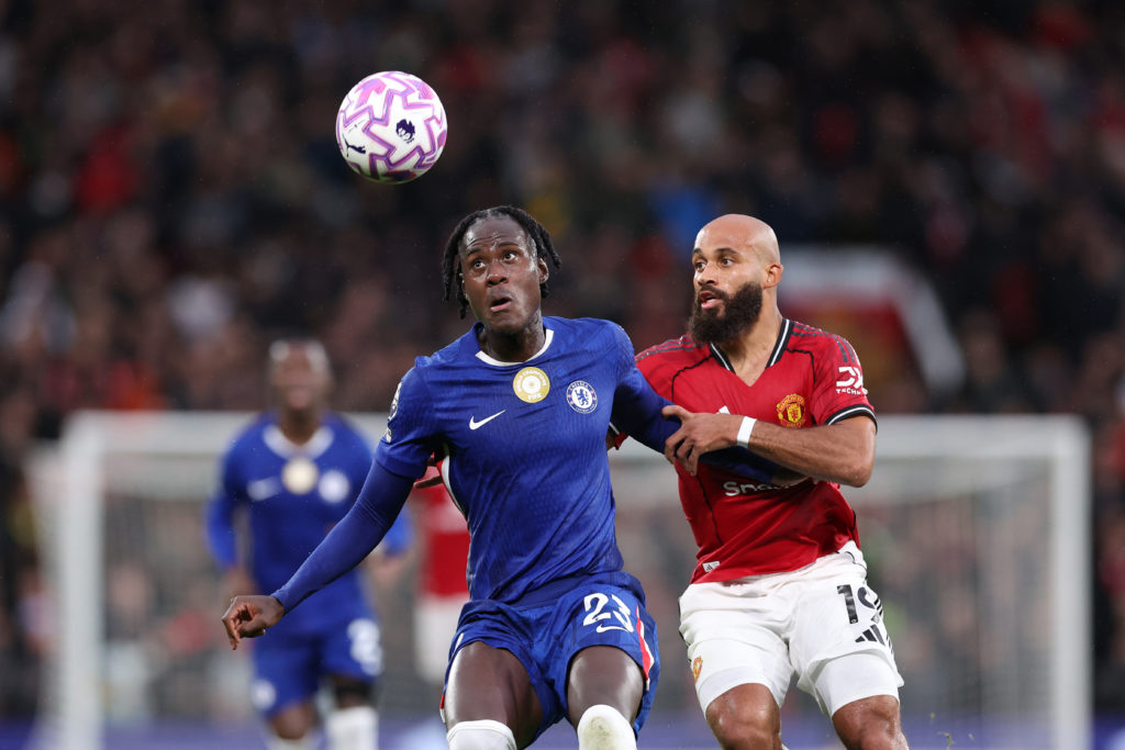 Trevoh Chalobah battles for possession with Bryan Mbeumo during the Premier League match between Manchester United and Chelsea at Old Trafford in 2025 in Manchester, England.