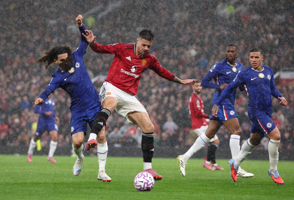 Marc Cucurella of Chelsea and Benjamin Sesko of Manchester United battle for possession during the Premier League match between Manchester United and Chelsea at Old Trafford on September 20, 2025