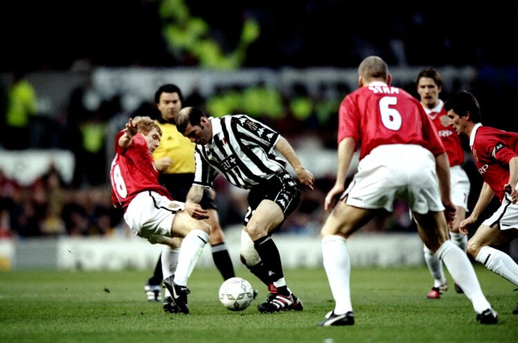 7 Apr 1999:  Zinedine Zidane of Juventus takes on Paul Scholes of Manchester United in the UEFA Champions League semi-final first leg match at Old ...