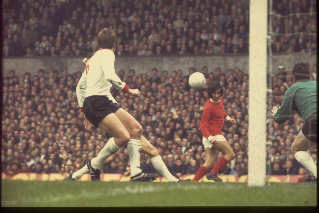 George Best playing against Liverpool