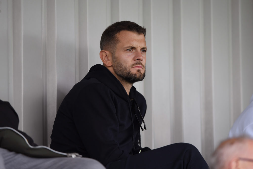 Jack Wilshere watching Arsenal U21s play Wolves