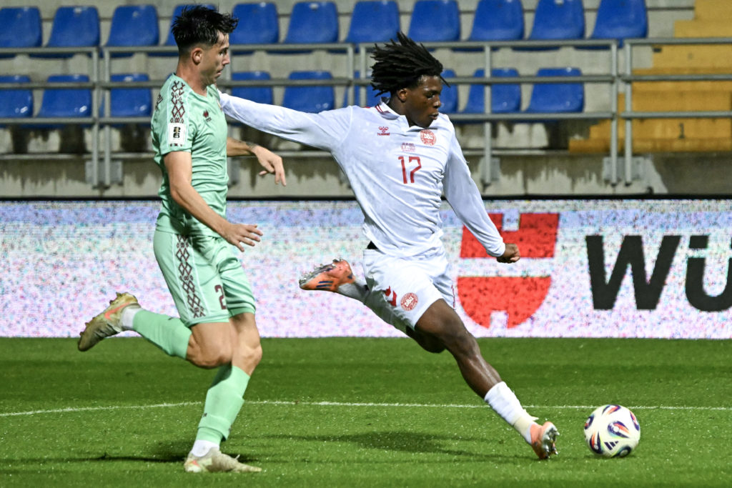 Patrick Dorgu preparing to cross the ball for Denmark.