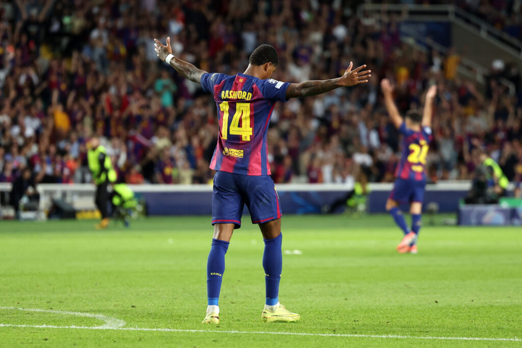 Marcus Rashford celebrates scoring for Barcelona.