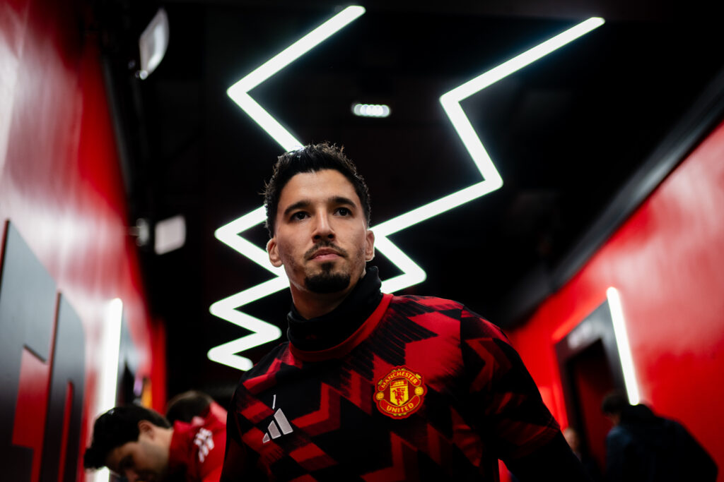 Altay Bayindir warming up at Old Trafford