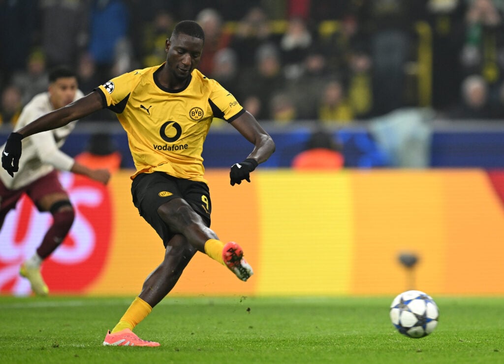 Serhou Guirassy scoring a penalty for Borussia Dortmund