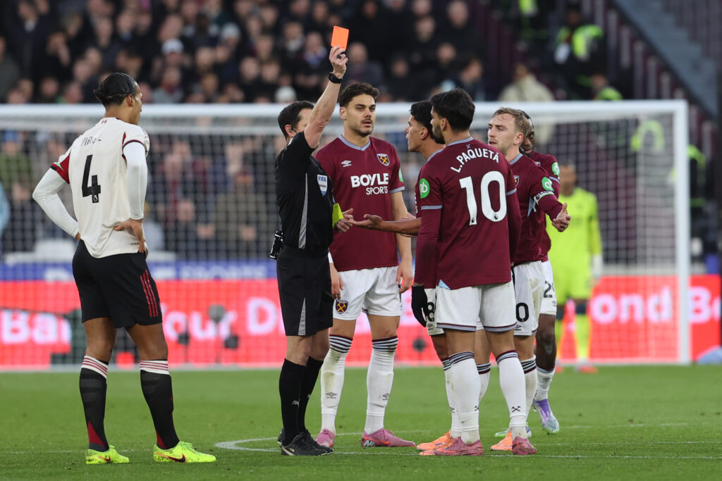 Lucas Paqueta of West Ham United is shown the red card during the Premier League match between West Ham United and Liverpool at London Stadium on November 30, 2025